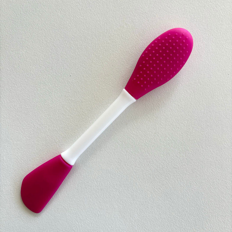 Double sided face brush