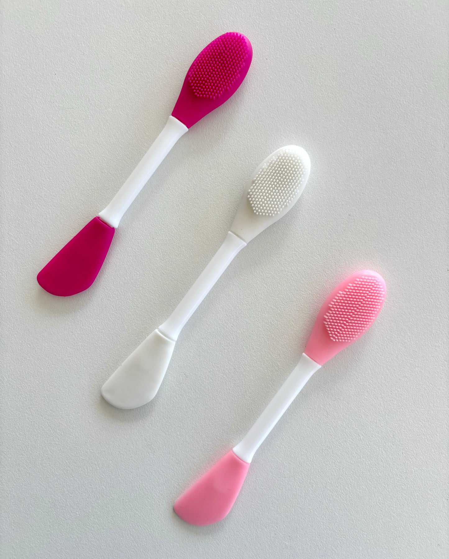 Double sided face brush