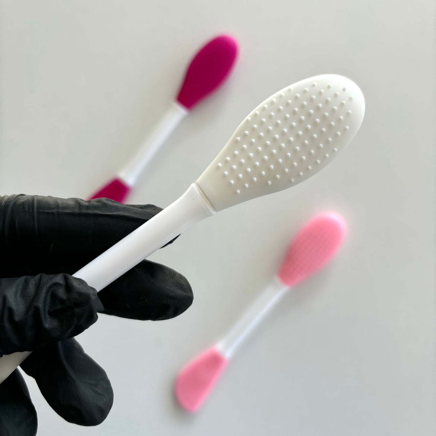 Double sided face brush